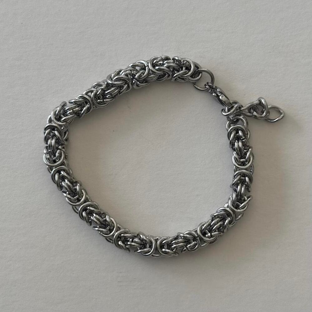 Vintage unique interlinked stainless steel